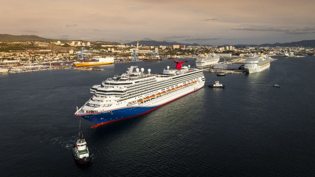 Carnival Freedom with her new funnel leaving the shipyard in Marseille, France
